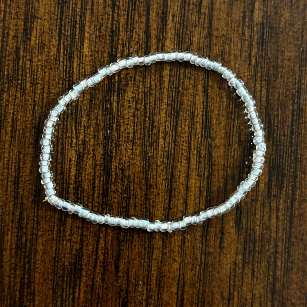 Clear Beaded Bracelet on Light Blue Stretchy String